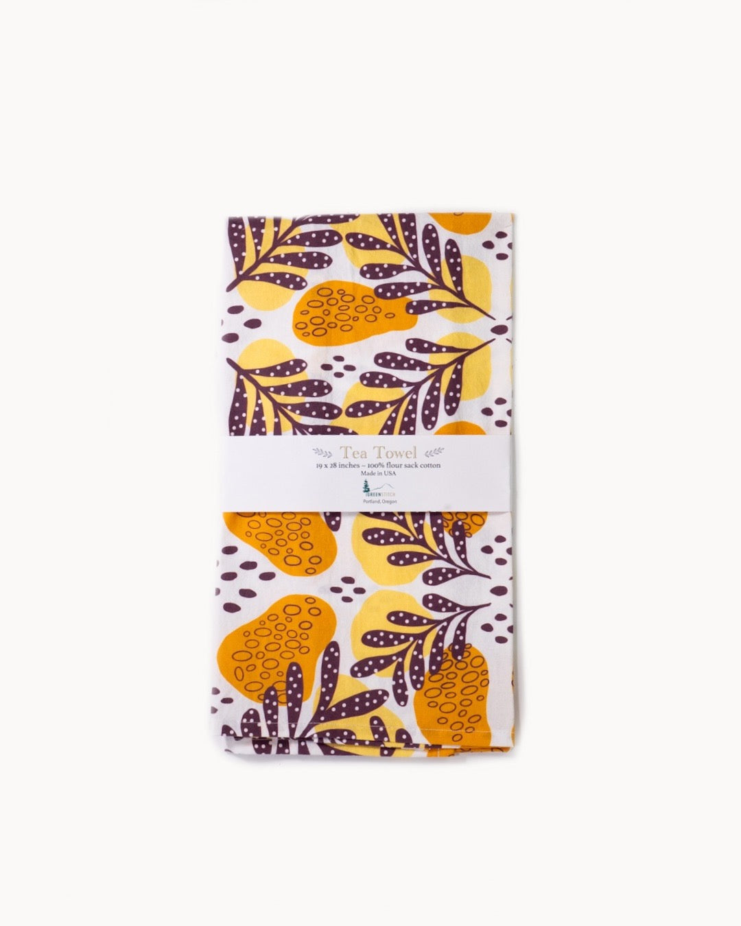 Yellow Dotty Leaf Tea Towel by Greenstitch